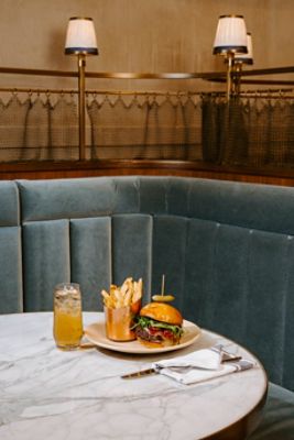 The highlight of our lunch menu, the Grana Burger features two smash patties with melted cheese, crispy prosciutto and roasted garlic aioli.